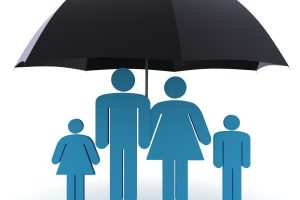 Blue abstract family of four (two adults, two children) standing together under a large black umbrella, symbolizing protection and safety.